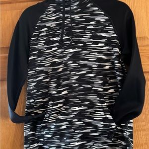 Elevate your athleisure game with THIS Nike women's THERMA-FIT SWEATSHIRT.